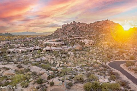 Discover the epitome of luxury living at 10671 E Hedgehog Pl in the exclusive Tierra Encantada community within Troon North, Scottsdale, AZ. This rare double lot spans 2.12 acres in a gated enclave, offering unparalleled privacy and security. With a ...