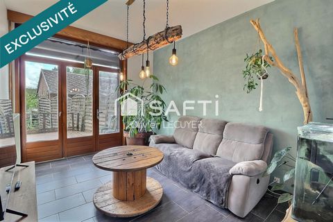Maison mitoyenne de caractère en village, 3 chambres + 1 grenier, terrasse, jardin et garage. Belle prestation!
