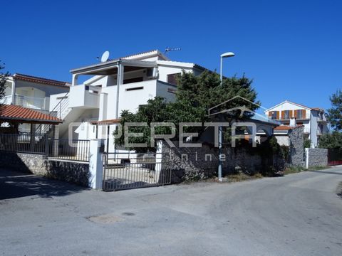 House with 2 apartments and swimming pool, Rogoznica-Ražanj A detached house with a swimming pool in Ražnje is located in a quiet location, only 150m from the sea and the beach. This charming property is spread over a plot of 524 m² and offers the pe...