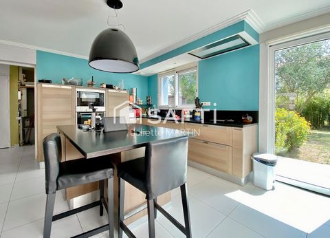 Maison moderne, fonctionnelle et chaleureuse