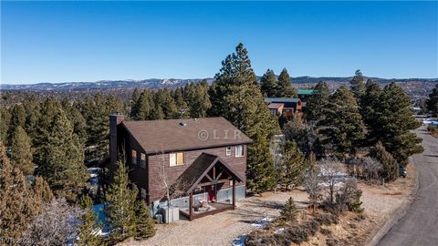 Located in the upscale, year round accessible neighborhood of Elk Ridge, this 3 bedroom/3 full bathroom cabin resides. A bedroom, bathroom & living area on each level. Primary bedroom features a wood burning fireplace, walk in closet, jetted tub & is...
