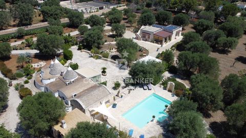Immersed in the lush greenery of centuries-old olive trees in the Ostuni countryside, the 