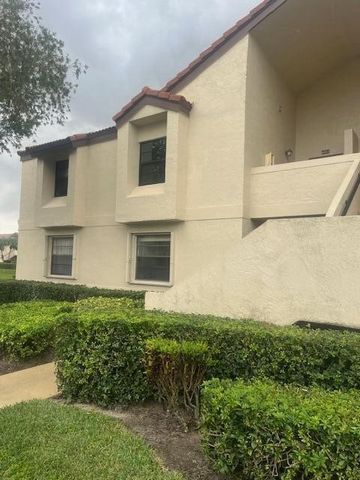 Don't miss this one! This most desired corner unit with vaulted ceilings has an abundance of natural light and is the largest unit in The Coves. This spacious 2 bedroom/2bath PLUS DEN (which can be easily converted to a 3rd bedroom) features IMPACT G...