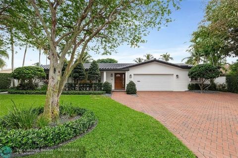 Indulge in the epitome of luxury living at this stunning waterfront property in the prestigious Coral Ridge neighborhood. With over 3,000 sqft under AC, this meticulously maintained 4 bed, 3 & 1/2 baths seamlessly blends elegance and comfort. Escape ...