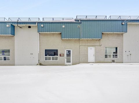 SUPERB turn key industrial and commercial condo with 2400 sqft laid out as following: 450 sqft on the 1st floor includes hall, reception and 2 offices nice interior finishing and with a 950 sqft mezzanine and 1000 sqft storage with a garage door of 1...