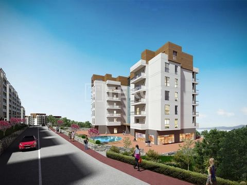 Real Estate with Sea View in Complex with Pool in Bursa Mudanya The real estate is in a project located in the Guzelyali neighborhood of the Mudanya district in Bursa. Guzelyali offers a tranquil family life with its extensive green areas surrounded ...