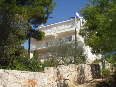 Discover the epitome of coastal living with this stunning, spacious apartment building in the serene village of Nečujam on the island of Šolta. Nestled just a stone's throw from the crystal-clear Adriatic Sea, this property offers breathtaking sea vi...