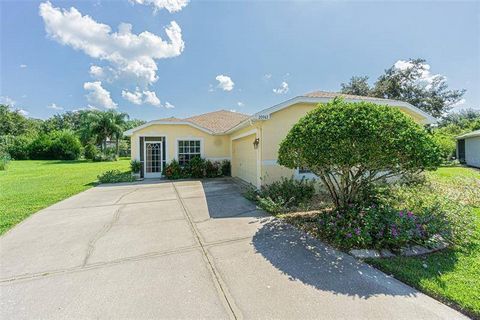 Welcome to your ideal Florida retirement retreat! This move-in ready **Single Family Home** offers 2 spacious bedrooms, 2 bathrooms, plus a versatile den and a unique **2.5-car garage** setup. The main 2-car garage is conveniently located to the side...