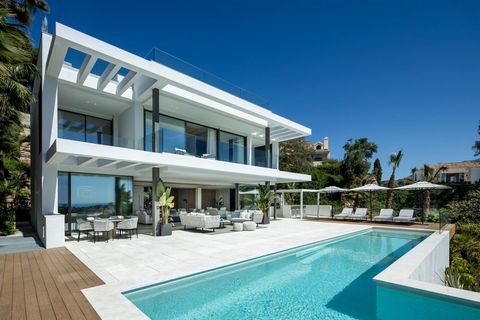 Magnificent modern villa nestled in the prestigious Benahavis area, offering unrivaled sea views and a prime location. Generous terraces allow for alfresco dining and relaxed gatherings, while the private infinity pool sets the stage for summer enjoy...