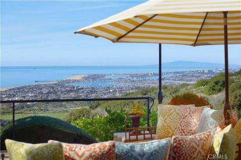 Ever-changing by day and night, the phenomenal panoramic views of 'Villa Saffron' are in a league of their own. They are experienced from both levels of the St. Tropez-inspired villa at guard-gated Pelican Crest in Newport Coast. The immersive vistas...