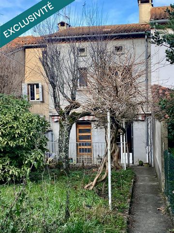 Maison de ville avec garage et jardin