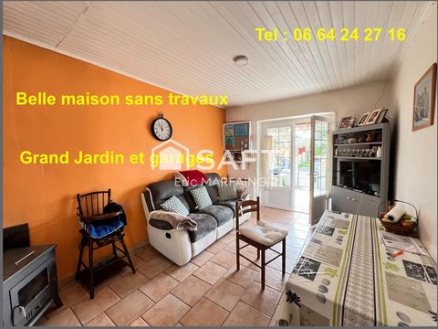 Maison de village sans travaux avec garages et jardin