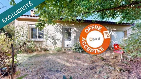 Maison de plain-pied avec garage et terrain clos