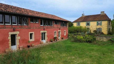 Ensemble immobilier empreint de charme, d'authenticité et d'une élégance discrète.