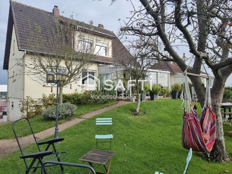 Maison familiale avec véranda plein sud et jardin arboré : un havre de paix à Saint-Hilaire-Petitville.