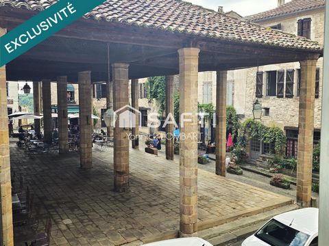 Immeuble (5 appartements) + un local commercial