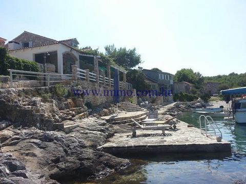 Lovely seafront house for sale, located in a quiet bay on the island Vis. It is well decorated with stone and numerous details which make this house unique (amphora, ancient anchors, olive press made of stone etc.). The house is arranged over two flo...