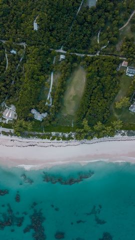 Welcome to the epitome of coastal elegance on Harbour Island! Prepare to be enthralled by this stunning oceanfront lot, nestled near the northern tip of the island. Spanning an expansive 1.795 acres, this picturesque property is surrounded by prestig...