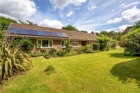 Hidden snugly off of Station Road behind a well screened hedge, in the scenic village of Woldingham, this expansive detached bungalow boasts a gross internal area just shy of 1,730 ft². Dating back to 1962, the property’s characteristics render it ri...