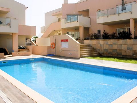 A beautiful ground floor apartment situated within a modern gated complex, in the village of Burgau, just a few minutes from the beach and other amenities. This spacious 2-bedroom fully furnished apartment has a stunning open plan lounge/dining room ...