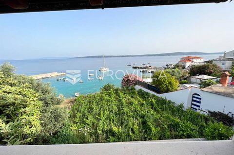 House for sale, first row to the sea in a beautiful bay on the island of Hvar. Basement tavern, ground floor apartments, first floor completely renovated (electrical underfloor heating in the bathroom), gas central heating with pool, stone fences thr...