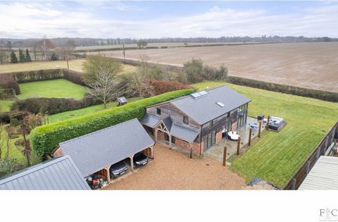 Located on the edge of the south Leicestershire/Northamptonshire border, The Granary is a four bedroom barn conversion in an open countryside setting. The former structure has been totally renovated and redesigned to prioritise light, airiness and sp...
