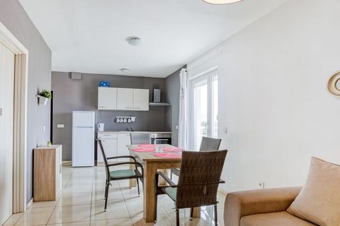 Have a gala time in this 2-bedroom apartment for 6 guests situated on the island of Pag. You have a barbecue, shared with other guests, for relishing grilled items of your choice, and parking facility which will keep your cars safe and scratch-free. ...