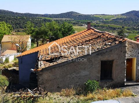 In a picturesque village lies an old stone house with a 50 m² footprint, accompanied by a 250 m² non-adjacent plot located 50 meters away. The walls are sturdy, the beams are beautiful, and while the interior is in ruins, the space holds immense pote...