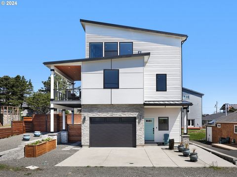 Seaside Oceanview escape! This luxurious modern home, just steps away from the beach, offers a magazine worthy blend of coastal charm & contemporary elegance. Step inside to discover durable laminate plank flooring, quartz counters & stained ceramic ...