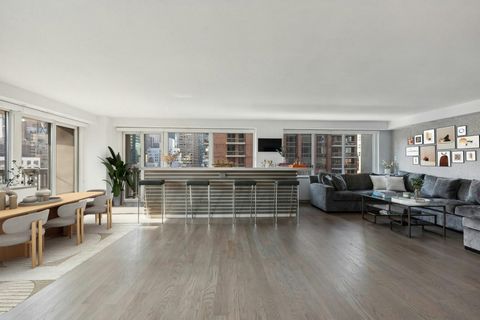 Welcome home to unit #1402/1403. This extraordinary residence is a meticulously renovated 2-bedroom, 3-bathroom apartment creating an expansive and inviting open-concept living space perfect for modern living. Spanning approximately 2,000 square feet...