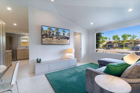 Welcome to this exquisitely remodeled condo located in the heart of Palm Springs' coveted Historic Tennis Club neighborhood. Just a five-minute stroll from downtown, this one-of-a-kind residence is surrounded by renowned luxury hotels, including Amin...