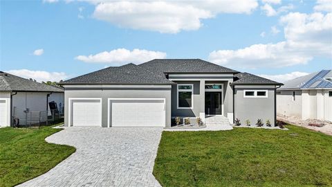 This exquisite brand new built home, nestled in the idyllic north end of South Gulf Cove, is now complete and move-in ready! Situated along the serene Alsask Waterway, this opulent 3-bedroom, 2-bathroom home with an epoxied 3-car garage and heated po...