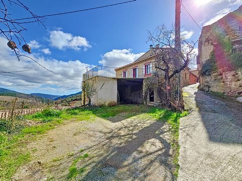 Maison avec terrasse et garage à la vue dégagée et dominante