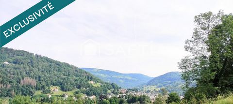 Rare, ce superbe terrain à bâtir, enclos, au calme avec sa vue dégagée panoramique sur la vallée et les massifs