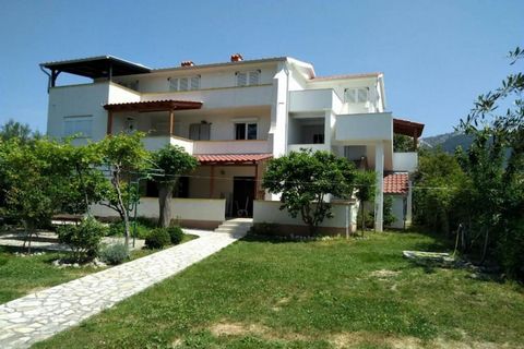Apartments Verović Rab Banjol is a well-appointed, family- or group‑friendly holiday home in scenic Banjol, featuring spacious indoor living, multiple bedrooms/bathrooms, terrace dining, proximity to beaches, and locally celebrated hospitality. It is...