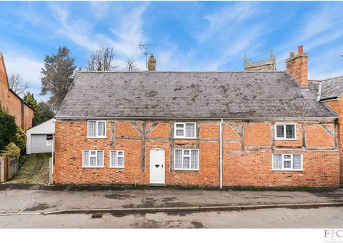 Imagine owning a Grade II listed cottage nestled in the heart of a charming Leicestershire village, filled with original features. This spacious four-bedroom semi-detached home was once three separate properties, that now interconnect to form a uniqu...