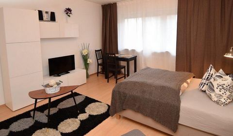 Modern furnished one-room apartment with balcony, a fitted kitchen with everything needed, and a bathroom with bathtub. In the living-sleeping area, you can relax on a comfortable box spring bed. A flat-screen TV with cable connection is also availab...