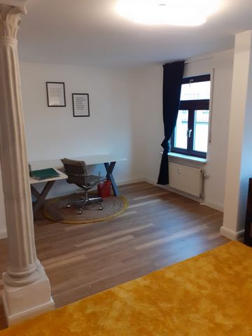 Beautiful loft above the rooftops of erlangen with very high quality and fashionable furnishings. The location is super central, but still quite quiet, because the apartment is built to the back out. An underground parking space is already included i...