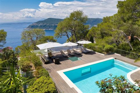 Summary A stunning contemporary villa, perfectly situated on the western slope of Cap Ferrat, in close proximity to Passable Beach. Boasting breathtaking views of Villefranche harbor, the sea, and the encompassing mountains, it enjoys a serene and re...