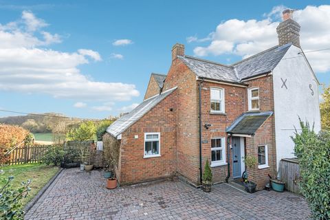 Fine & Country are delighted to showcase Sunnybank Cottage, a beautifully presented four bedroom detached family home. Originally built in 1892, this attractive period property offers generously well-proportioned accommodation. The ground floor compr...