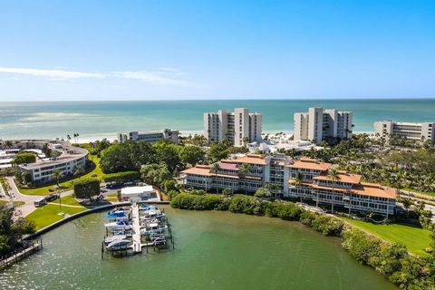 Enjoy breathtaking Bay and Skyline views from this fully, and opulently, updated (2023) condominium in paradise. TURNKEY FURNISHED with all new furniture. Rare opportunity to own a highly sought after 1-7 DAY RENTAL on Longboat Key with private BEACH...