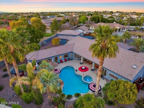 Full roof replacement 2023. 2 new HVAC's 2022. Expansive resort lot focused to entertain and relax in a beautiful setting. Spoil yourself daily in the fully equipped outdoor kitchen overlooking the sparkling pool and spa. Spacious patios winding arou...