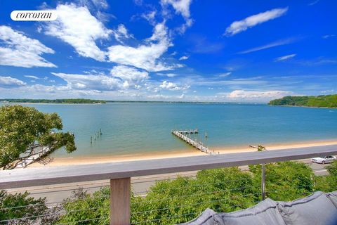 Introducing a luxurious 6-bedroom, 5.5-bathroom waterfront home in Shelter Island, NY. This modern beauty spans 1.31 acres and boasts 332' of private sandy beach*, along with two docks (one with water and electric) that accommodate a 5-6' low tide dr...
