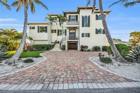 Nestled along the pristine shores of Casey Key, this luxurious residence optimizes coastal living at its finest. Boasting breathtaking panoramic views of the Gulf of Mexico, this 4-bedroom, 4.5-bathroom plus pool room with full bath, home is a master...