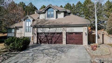 Welcome to this beautifully updated Colorado dream home located in the highly desired Ranch Golf Course Community on a large 17,000 + SqFt lot. Upon entering you are greeted by flowing refinished hardwood floors, new carpet, stunning wood beams, case...