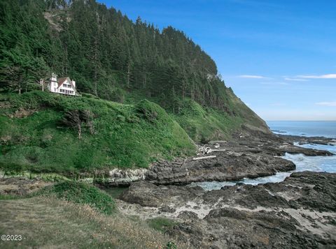 Welcome to the captivating Cleft of The Rock Lighthouse, nestled on the stunning oceanfront of Yachats, Oregon. This exceptional property offers a truly unique opportunity to own a home with a beautiful lighthouse, surrounded by two acres of coastal ...