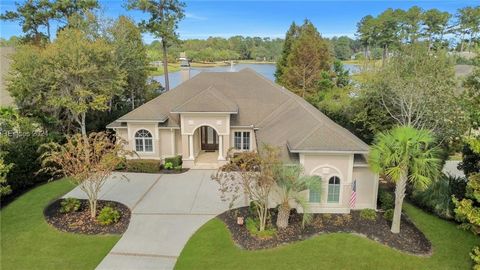 Nestled on one of the most desirable streets, this luxury home commands breathtaking lagoon views, with serene water vistas stretching toward the 10th hole of the prestigious Pete Dye course. Meticulously crafted, offering the ease of single-level li...