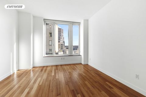 Welcome to 15 William Street, a stunning 1-bedroom, 1-bathroom residence located on the 31st floor in the heart of New York City. This contemporary home offers 800 sq. ft. of meticulously designed living space, featuring spectacular views of downtown...