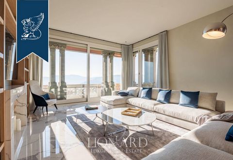 Perched in an exclusive location in Cernobbio with panoramic views of Lake Como and Villa d’Este, this luxurious penthouse spans 203 sqm within a historical villa. The apartment, on the third and top floor, features two bedrooms, three bathrooms, and...