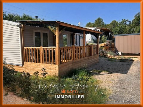 Terrain de 143 m² avec mobil-home de 35 m², 2 chambres, terrasse...dans une résidence sécurisée avec piscine.